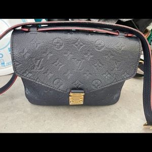 Blue and red Louis Vuitton Métis pochette